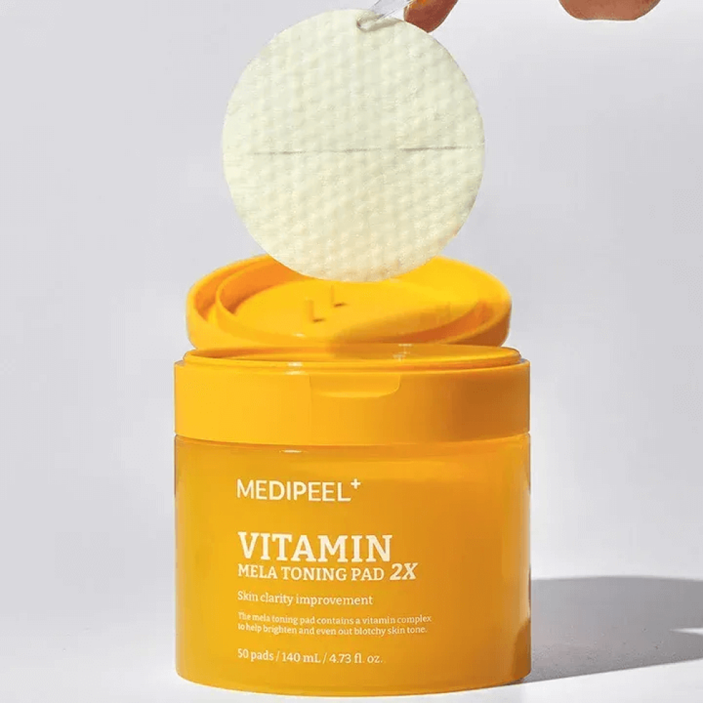 Тонізуючі вітамінні педи для обличчя - Medi-Peel Vitamin Mela Toning Pad 2X фото 2